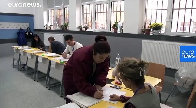 Romania's Iohannis wins first round of presidential vote as turnout nears 50%