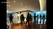 Chaos in Hong Kong as riot police use pepper spray inside shopping mall