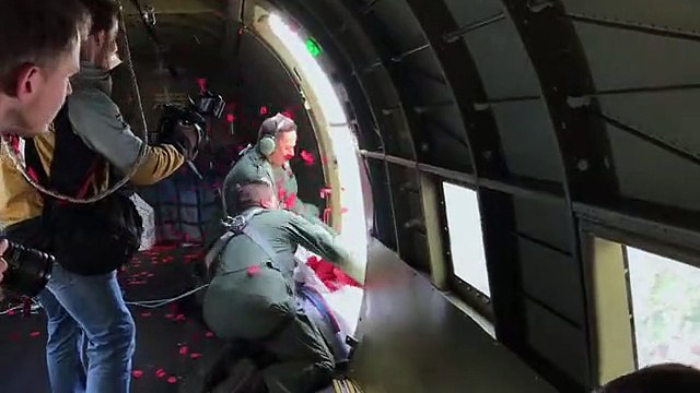 Moment poppies released from Dakota plane over White Cliffs of Dover