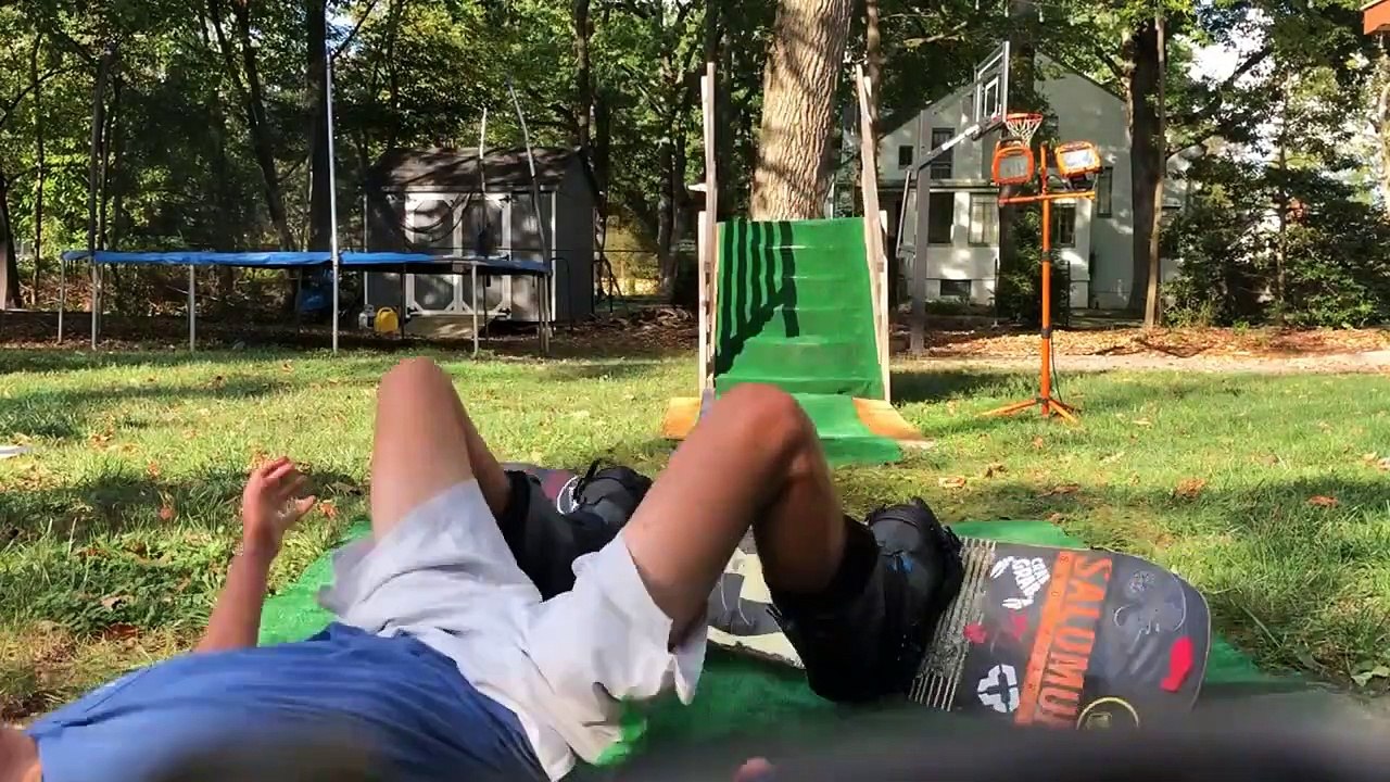 Kid Snowboards Down Stairs And Grinds A Rail