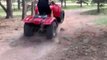 Guy Faces Fall After Jumping Ramp on Quad Bike