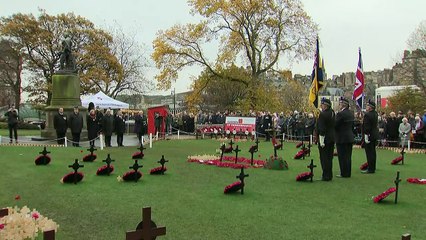 Nation falls silent to honour those who died in war