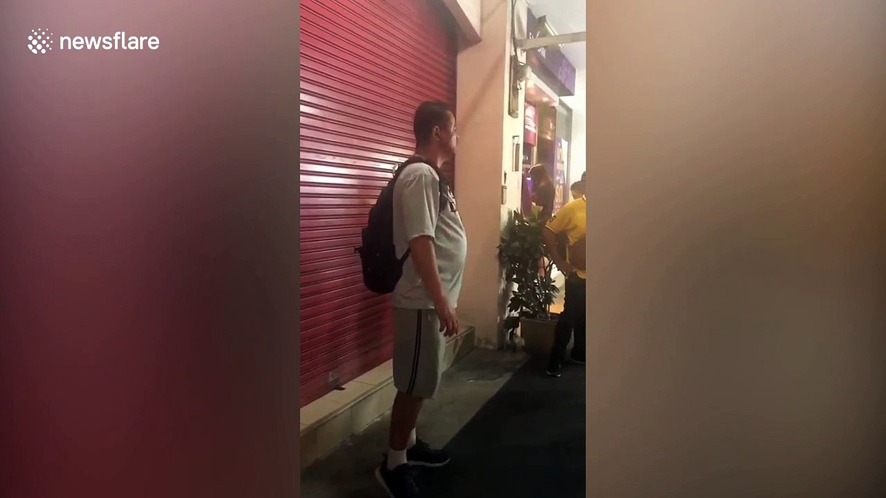 American tourist, 46, arrested after horrifying racist rant at stunned locals