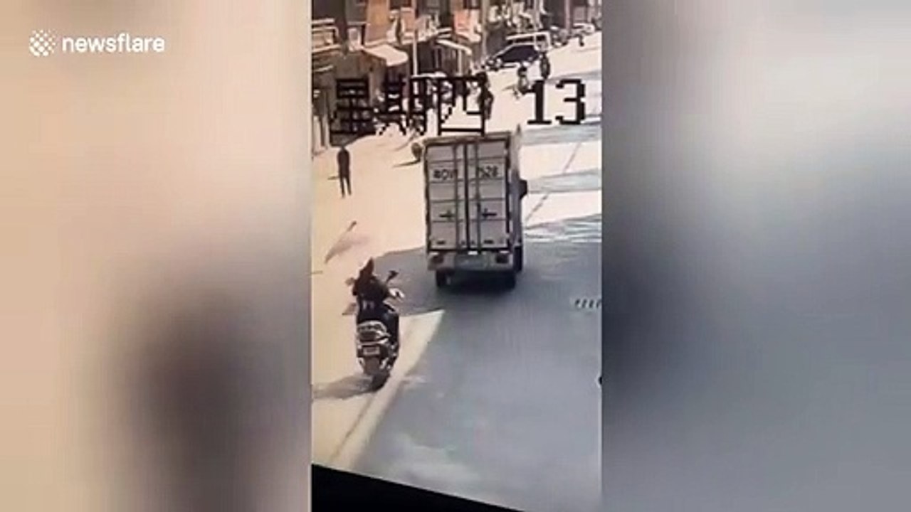 Scooter rider in 'bad mood' kicks random elderly man to the ground in China
