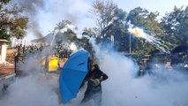 Day of violence unfolds as Hong Kong enters sixth month of protests