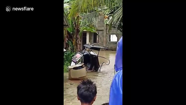 House collapses after Typhoon Nakri causes severe flooding in the Philippines