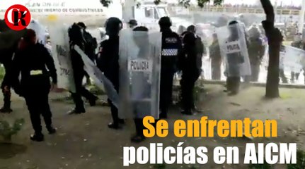 Se enfrentan policías en AICM