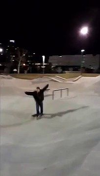 Skateboarder Grind A Rail And Falls On His Face