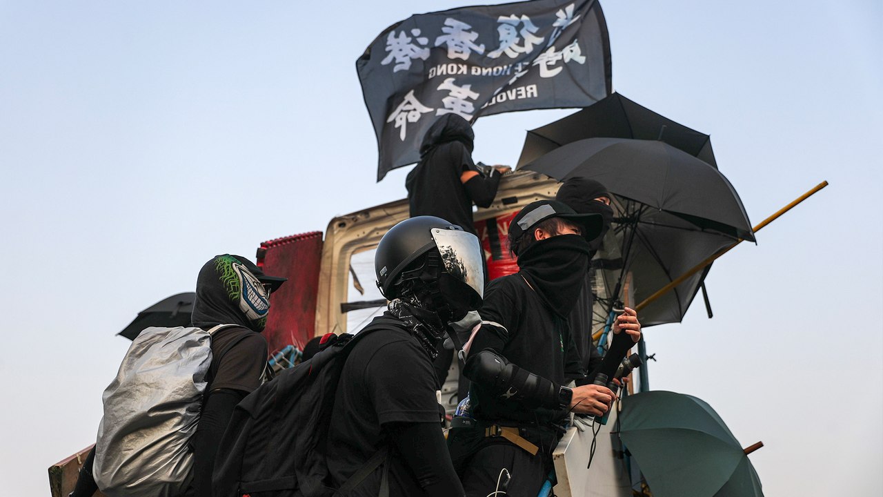 Student protesters hunker down at Hong Kong campuses in anticipation of clashes with police