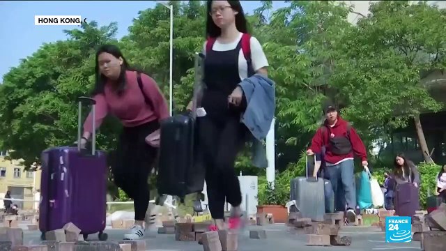 Feeling unsafe, students from mainland China flee Hong Kong