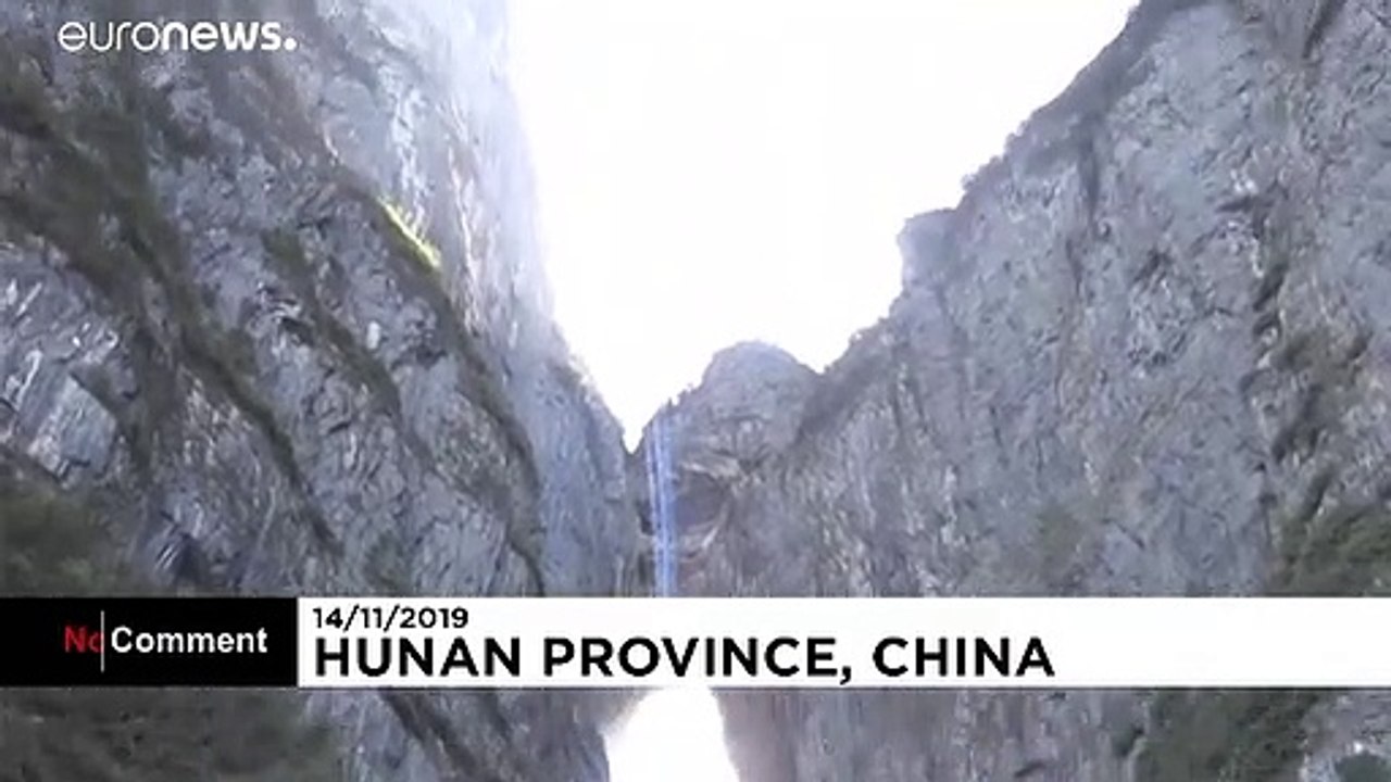 Jet-propelled French adventurers fly through world's highest cave
