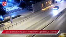 Alkollü sürücü, polisi 400 metre kaputta taşıdığı anlar kamerada
