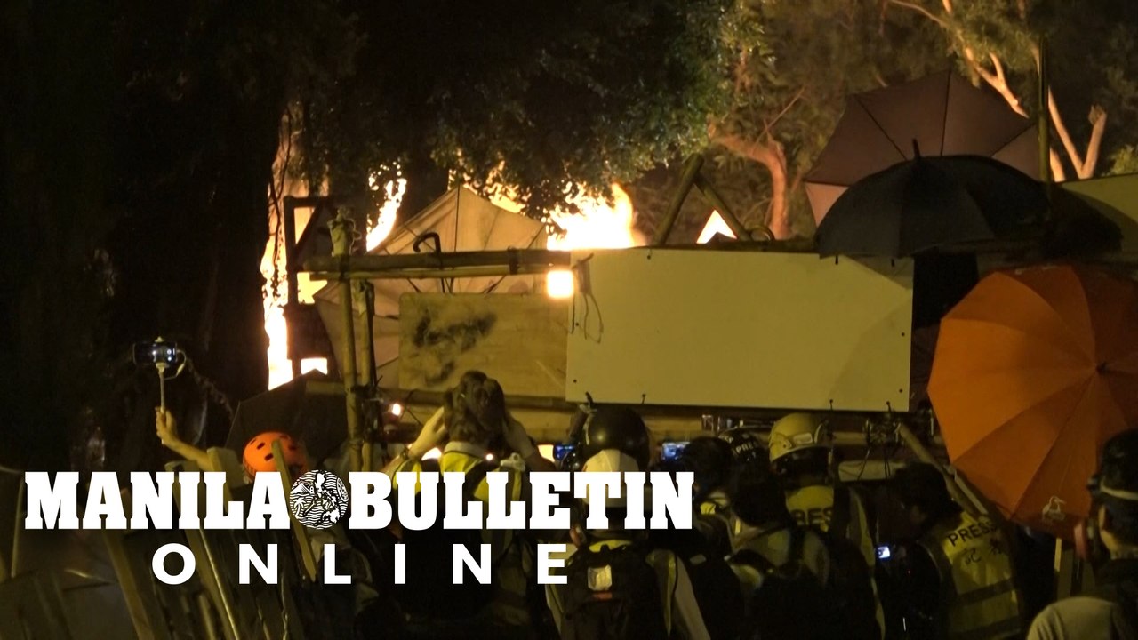 Hong Kong protesters set a van on fire