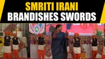 Smriti Irani performs 'Talwar Rass' at a function in Gujarat, Video viral | OneIndia News