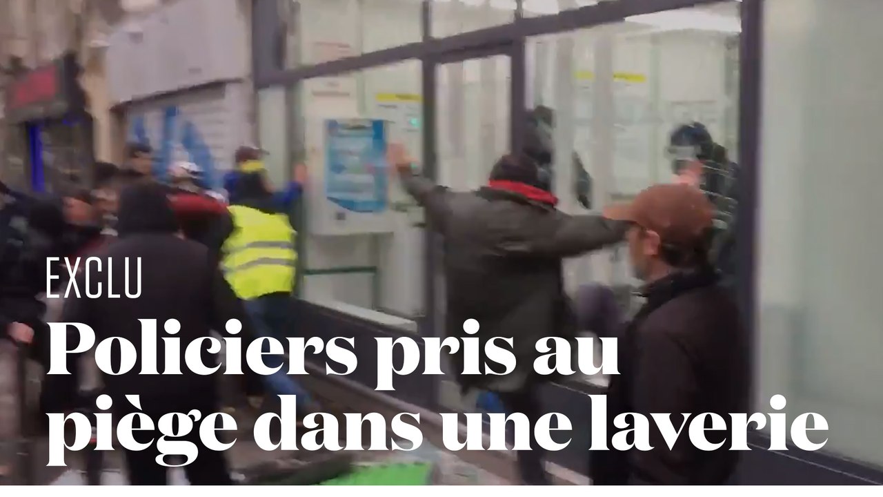 Deux policiers pris au piège dans une laverie face à des manifestants violents