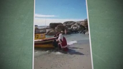 Pai Natal chegou em grande de barco.