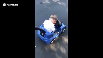 Adorable baby falls asleep on the wheel in Los Angeles