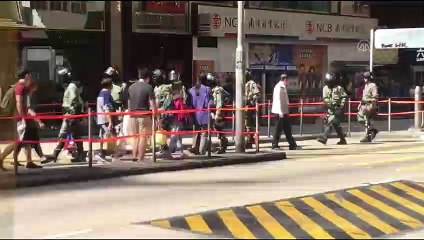 Protestolarda bir polis okla yaralandı - HONG KONG