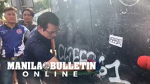 Manila Mayor Isko Moreno tried to remove a graffiti on a PLDT box using a tinner