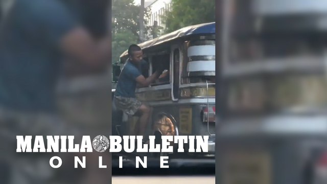 Man clings to jeep in taft Ave., punches passenger inside