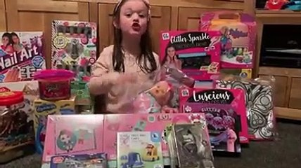 Halle is collecting toys for Radio Aire Cash for Kids