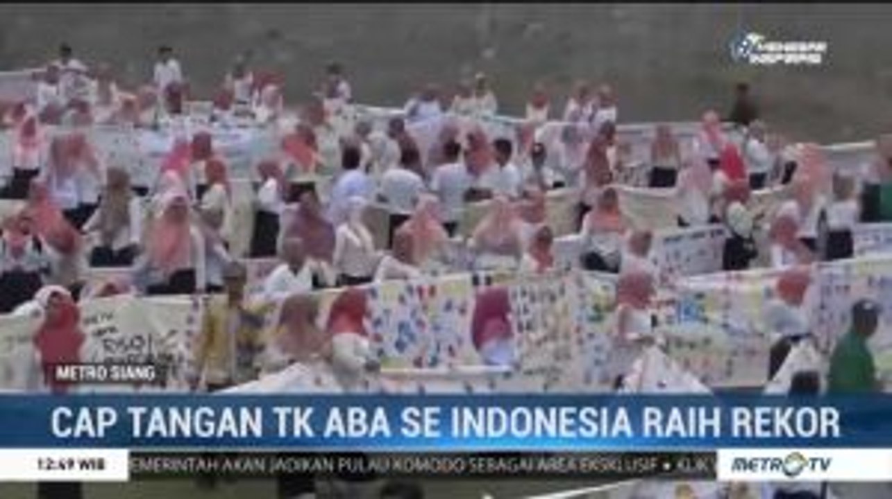 TK ABA Pecahkan Rekor MURI Cap Tangan di Atas Kain Terpanjang