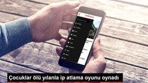 Çocuklar ölü yılanla ip atlama oyunu oynadı