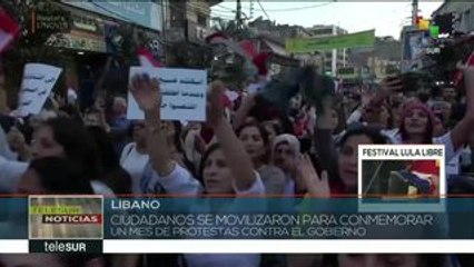 Libaneses conmemoran un mes de protestas contra el gobierno