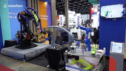 Robots make sushi and pour beers at trade show in Thailand