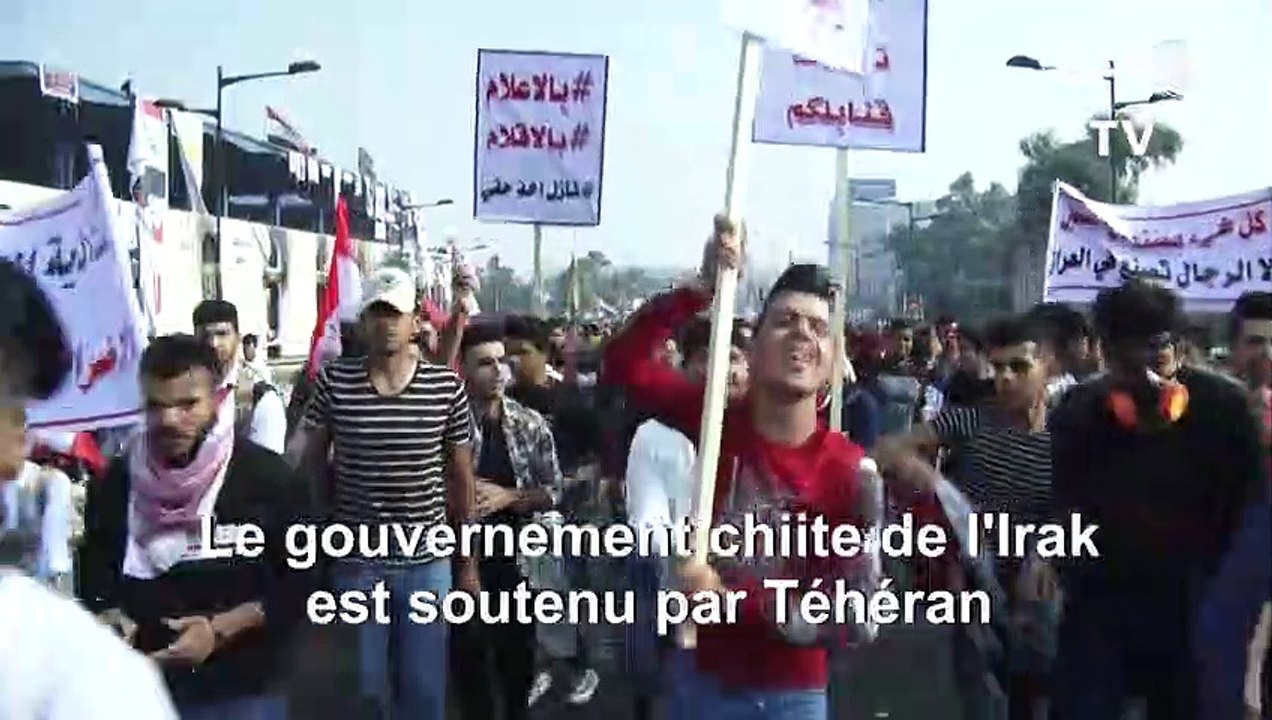 Des manifestants anti-gouvernementaux irakiens réagissent aux émeutes en Iran