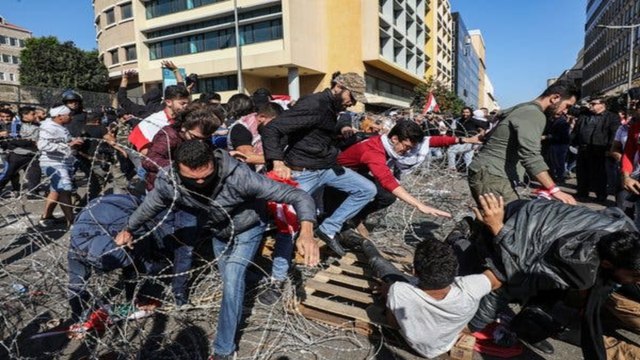 Protesters celebrate as Lebanon parliament session postponed