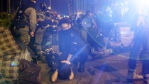 Hong Kong police chase down protesters trying to escape from Polytechnic University