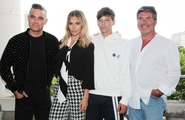Robbie Williams loved not being centre of attention on X Factor