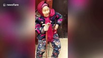 84-year-old daughter smiles after 107-year-old mother hands candy to her in China