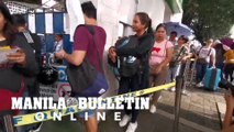 Filipinos who want to work abroad line up for International Certificate of Vaccination