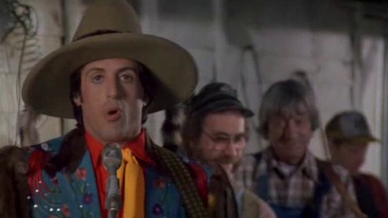 Sylvester Stallone singing a country drinking song