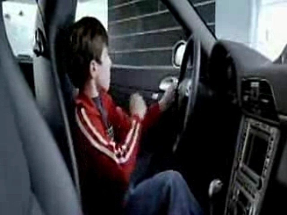 Boy Drools over Silver Porsche Carerra - Porsche Ad