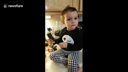Sneaky adorable little girl in New York makes a mess decorating a waffle