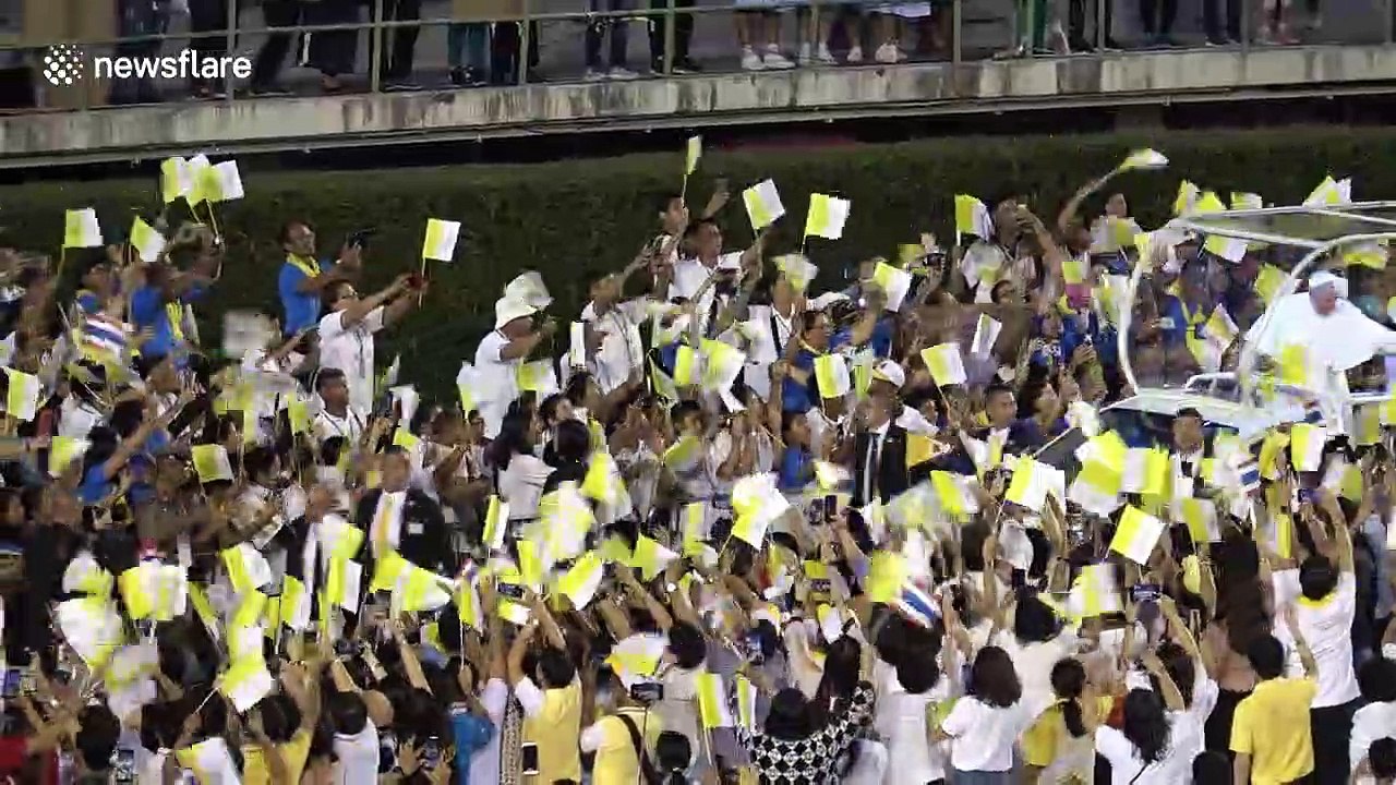 Pope Francis arrives to cheering crowds for Holy Mass in Thailand