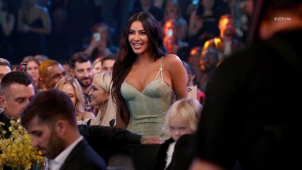 Kim Kardashian Looks Relatably Annoyed That Her Versace Dress Doesn't Fit