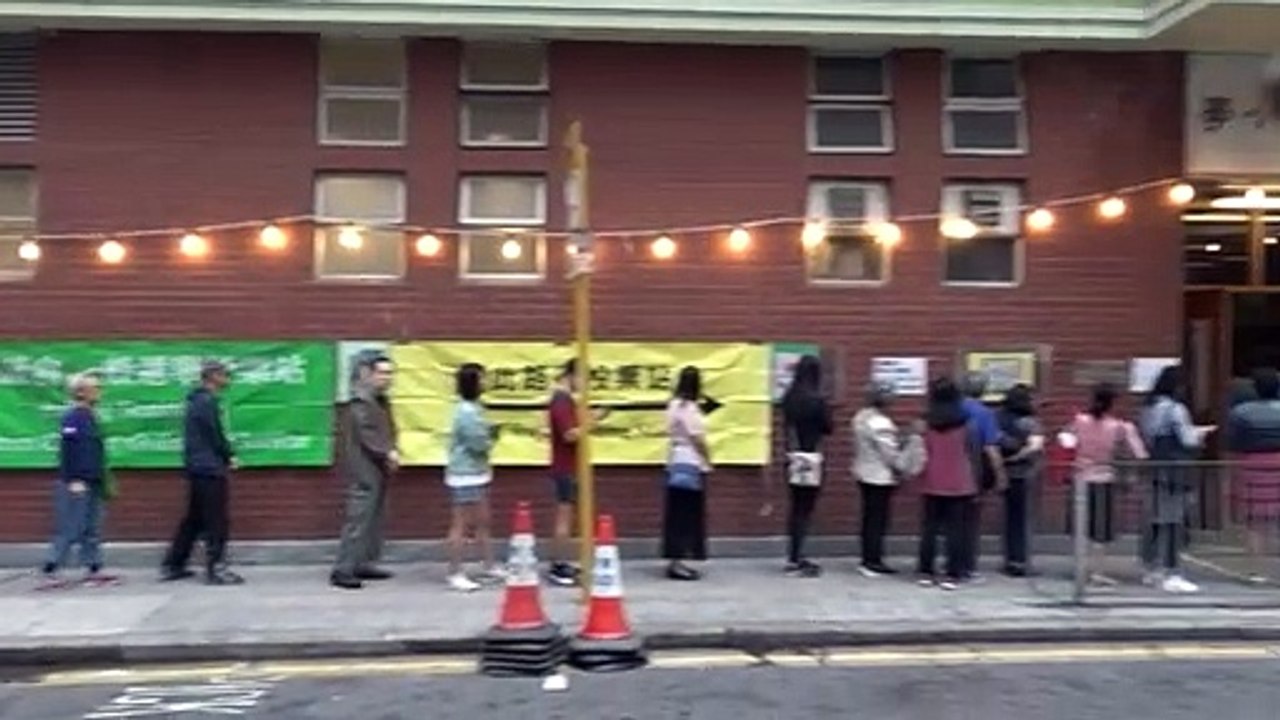 Long voter queues as Hong Kong democracy camp seeks poll gains