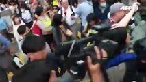 Pro-Beijing lawmaker heckled by crowd in Hong Kong