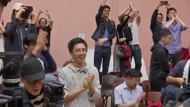 Hong Kong votes overwhelmingly for pro-democracy camp with record turnout in local elections