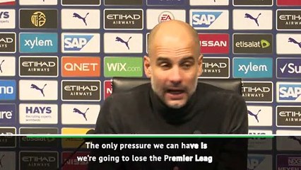 Guardiola not giving up on Man City's title defence