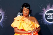 Lizzo brings tiny bag to American Music Awards