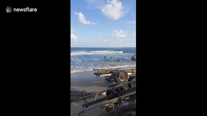 Thai beachgoer makes 'Baywatch'-style rescue on jetski to save drowning boy