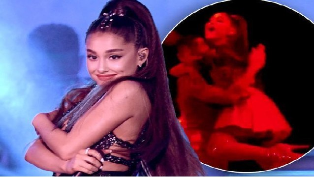 Oops! Ariana Grande falls off stage during concert, laughs it off