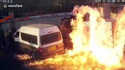Gas station employees in China extinguish fire that engulfed truck in just three minutes