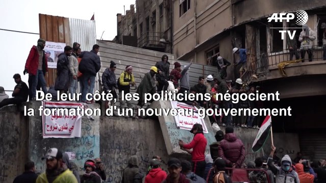 Des Irakiens manifestent rue Al-Rachid à Bagdad