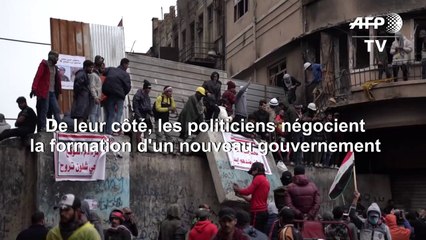 Des Irakiens manifestent rue Al-Rachid à Bagdad